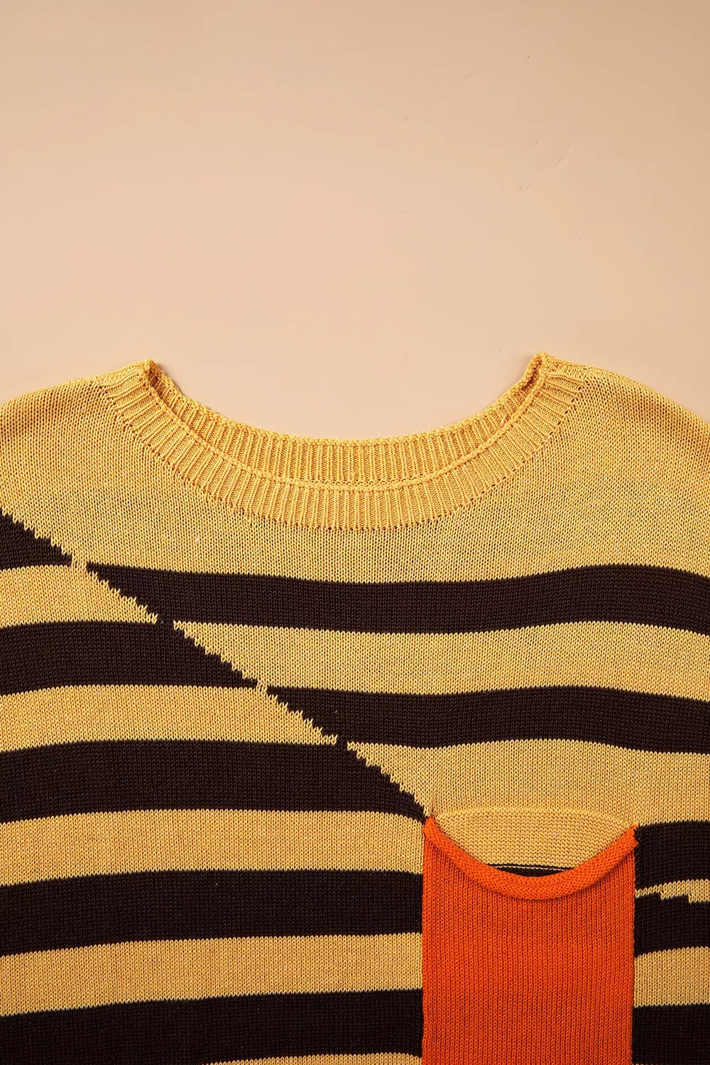 pullover sweater in mustard yellow with pocketed and hip-length