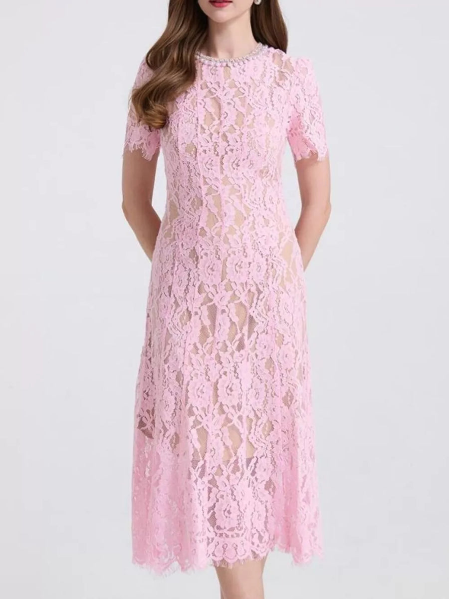 Pink lace midi dress with pearl neckline and short sleeves.