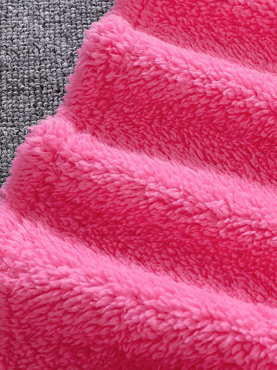 Fuzzy hot pink kids sweatshirt with plush texture.