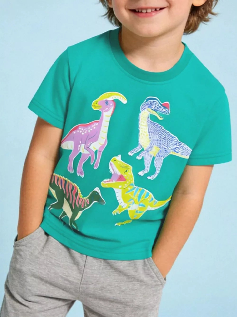 Children's teal cotton crew neck t-shirt with colorful dinosaur print