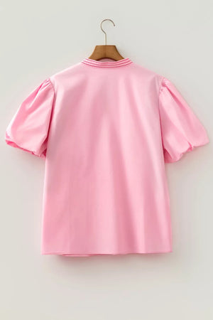 Pink cotton shirt with embroidered collar and puff sleeves