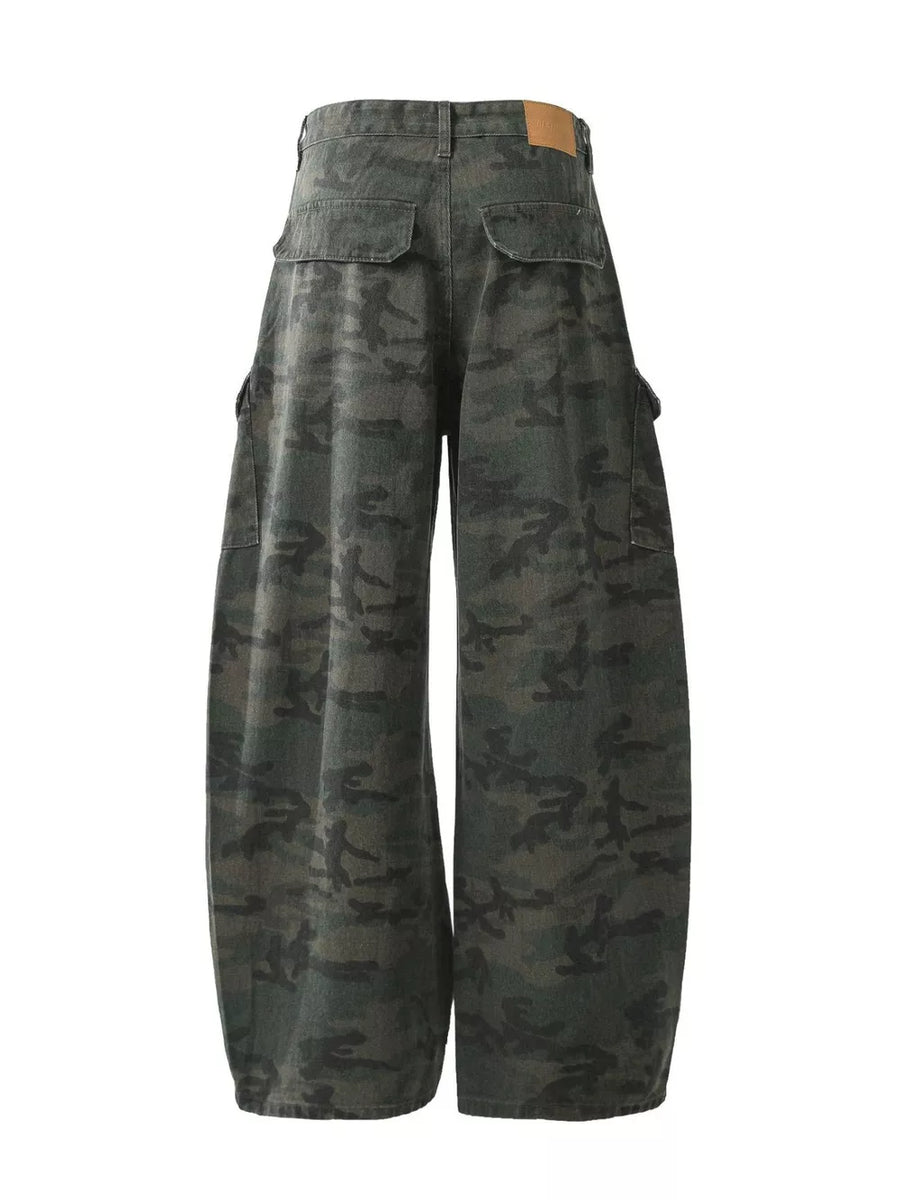 Baggy green camouflage cargo pants with button fly and multiple pockets.