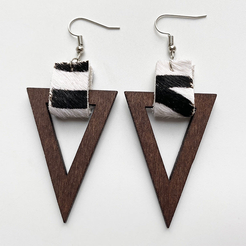 Leopard print & wood triangle earrings with metal hooks.