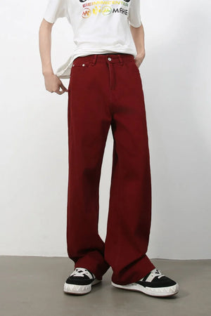 Burgundy wide-leg denim trousers with a casual, baggy fit.