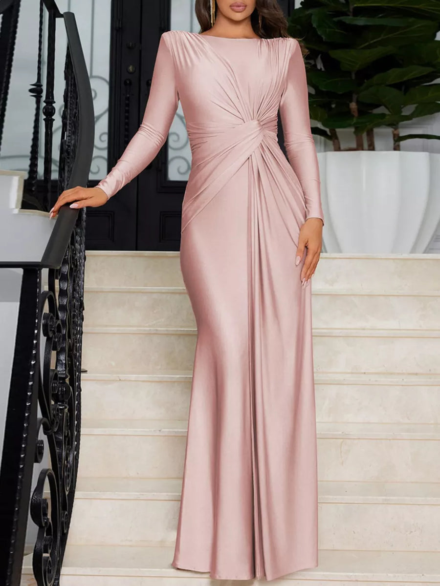 Pink ruched long sleeve maxi dress with boat neckline and bodycon fit.