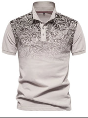 Khaki polo shirt with floral ombre pattern on the yoke and sleeves.