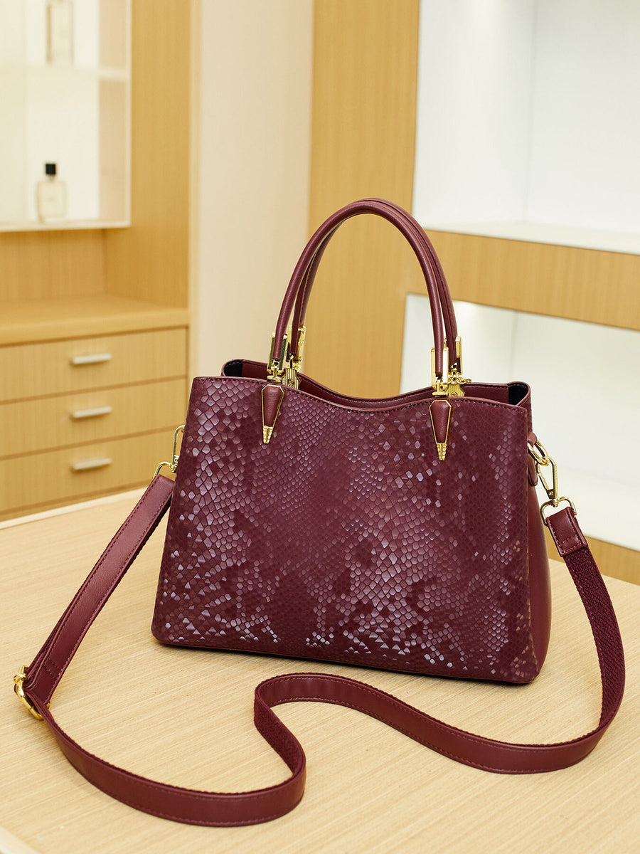 handbag in Wine Red with top handles and medium