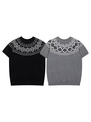 white crewneck sweater with knit construction and short sleeve