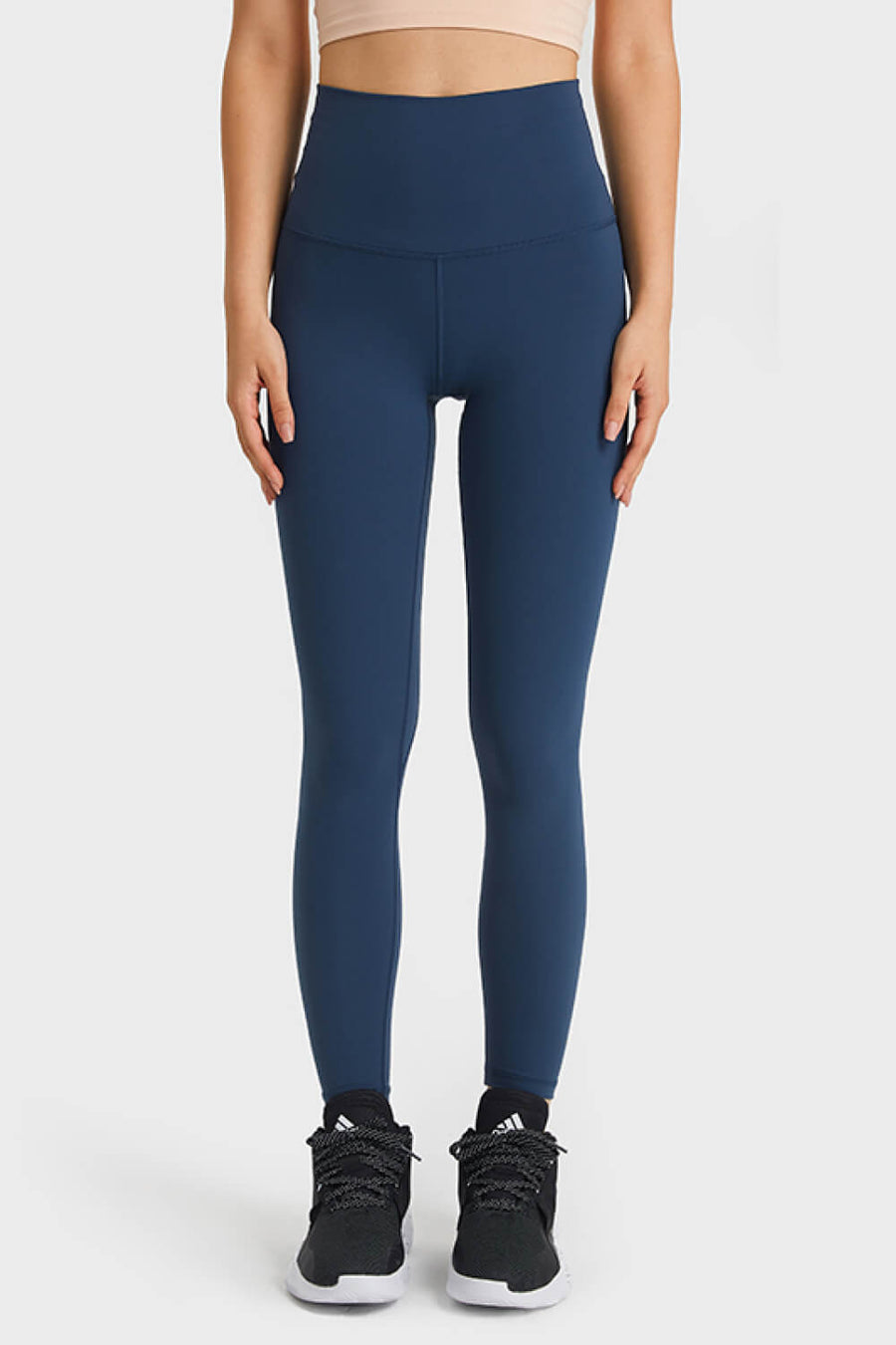 Navy high rise leggings with a seamless waistband and full length fit.