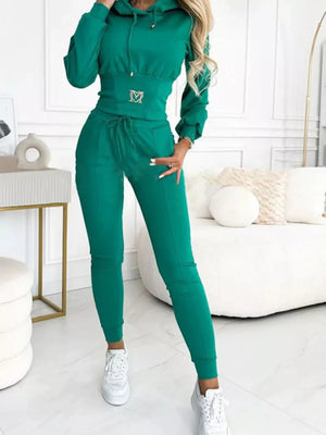 pullover hoodie in emerald green featuring drawstring and relaxed fit
