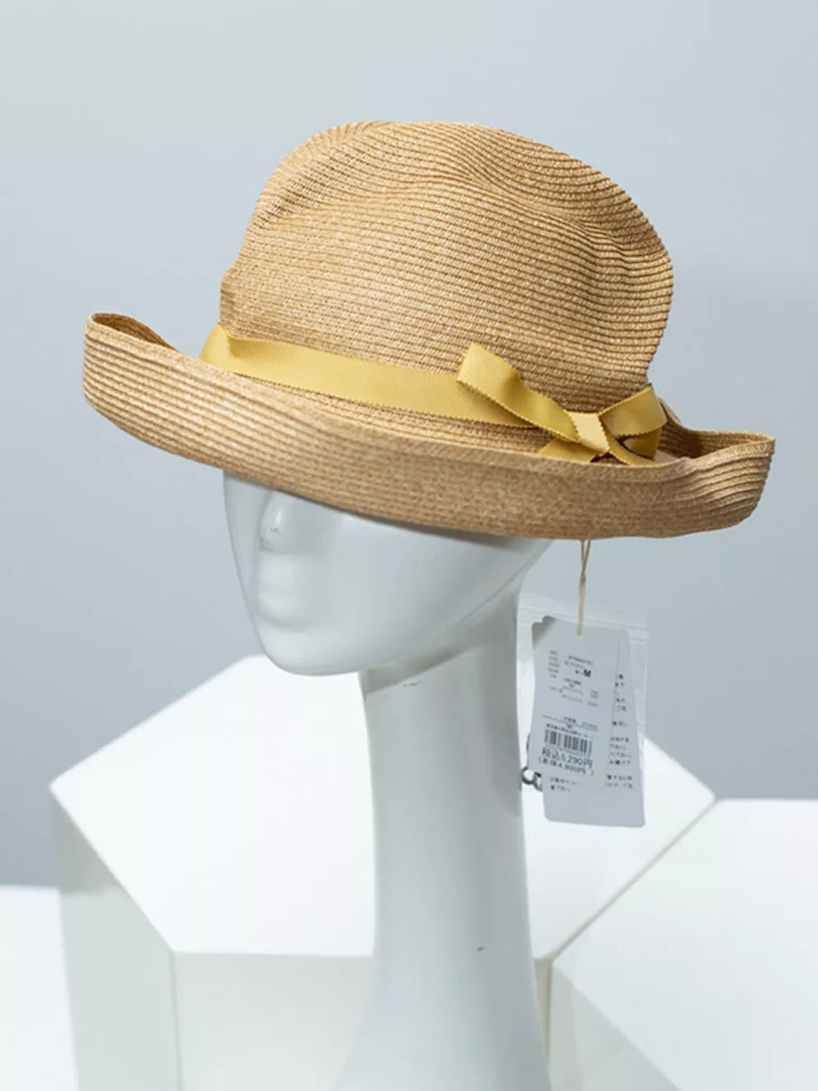 Straw sun hat with yellow ribbon bow detail