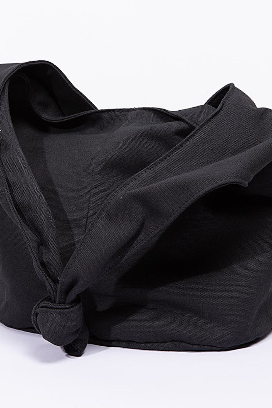 Black canvas shoulder bag with knotted strap detail