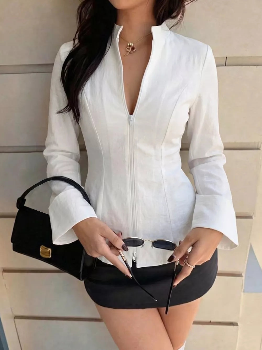 blouse in white featuring zipper and fitted fit