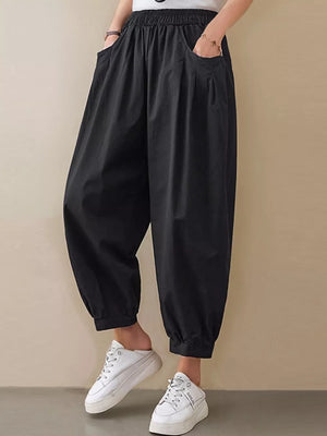 Black relaxed fit harem joggers with pockets and elastic cuffs