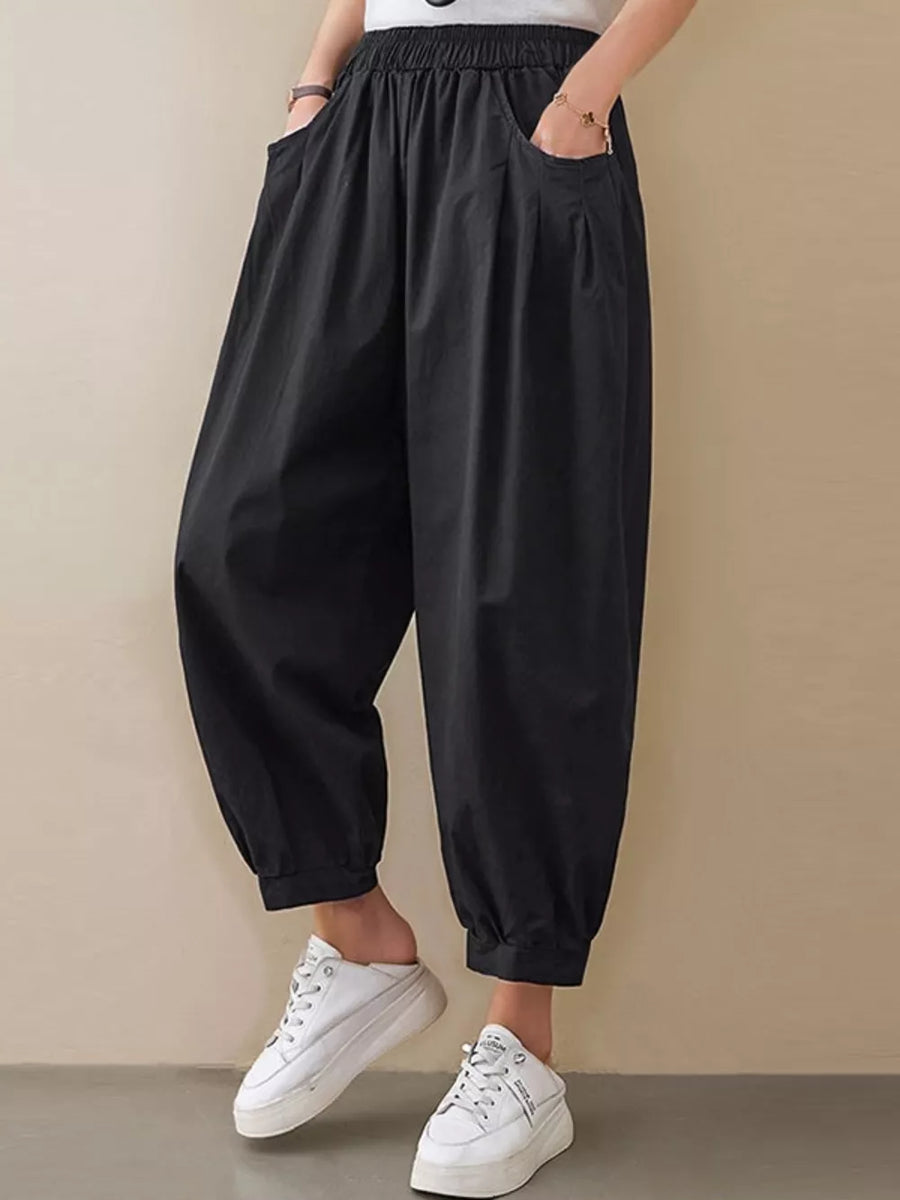 Black relaxed fit harem joggers with pockets and elastic cuffs