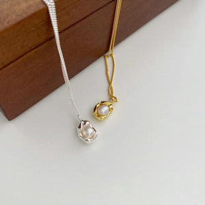 Sterling pearl pendant necklace in silver and gold with delicate chains