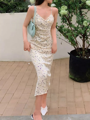 Floral ruched midi dress with spaghetti straps in beige with delicate print.