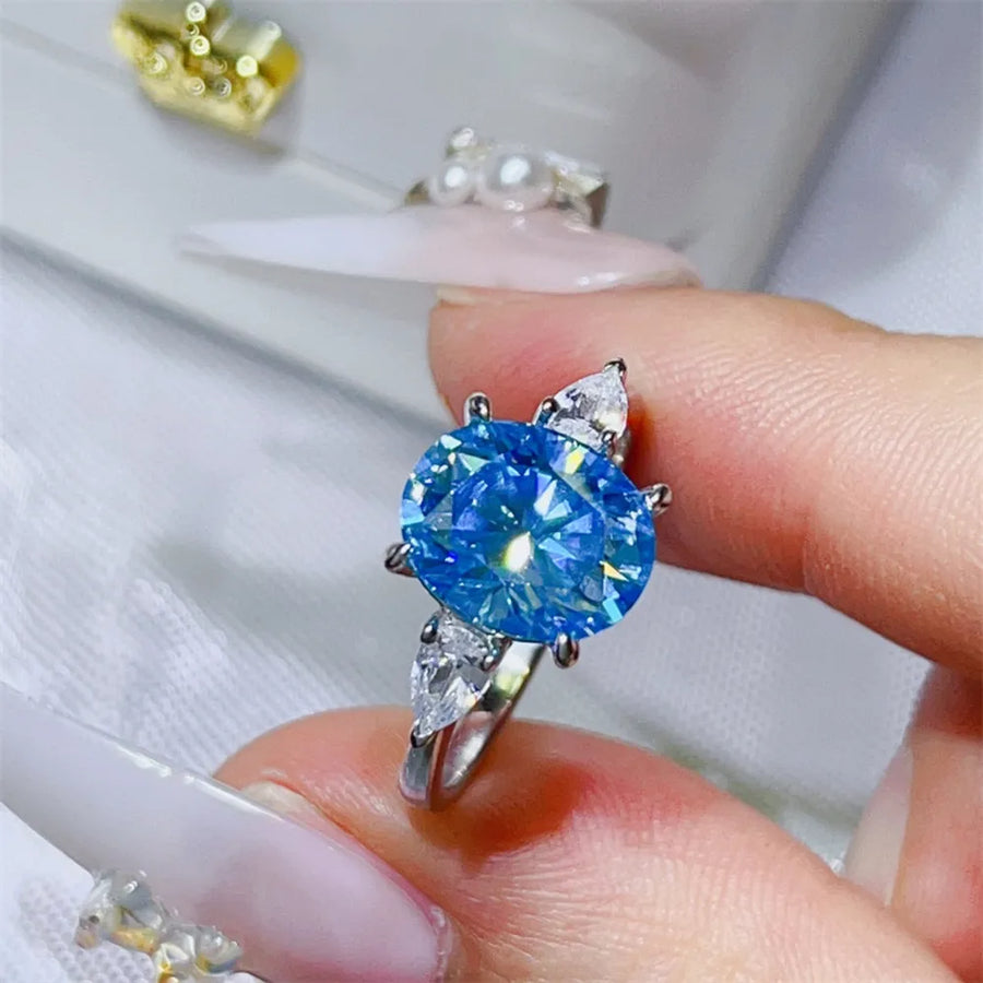 Platinum-plated, 925 sterling silver, Moissanite, Zircon (accent stones) Carat w ring in Blue with statement silhouette
