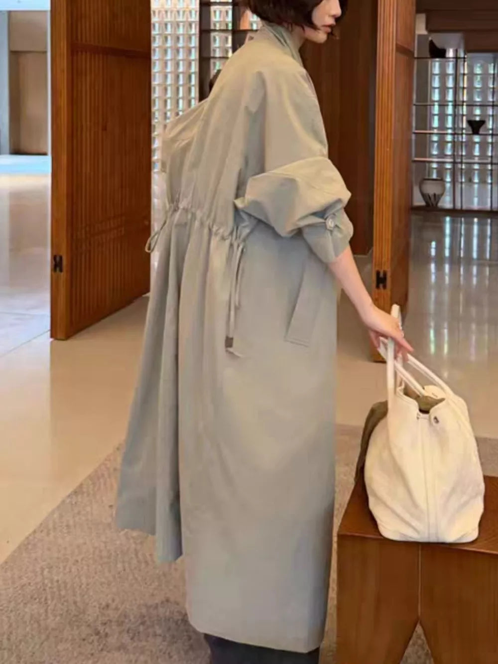50% cotton, 50% brocade Care instructions: Machine wash cold trench coat in Sage with oversized silhouette