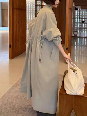 50% cotton, 50% brocade Care instructions: Machine wash cold trench coat in Sage with oversized silhouette