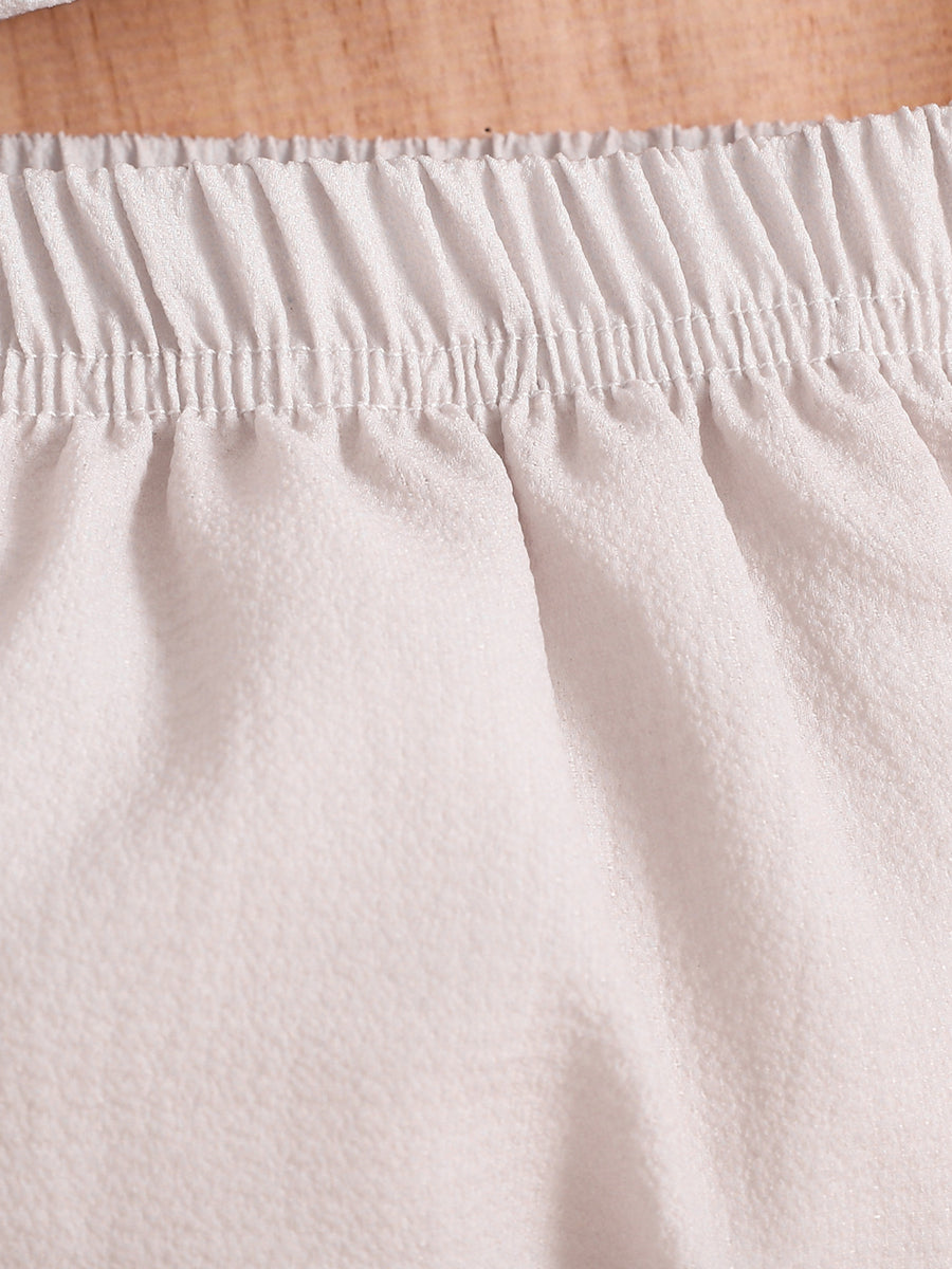 Baby cotton two-piece set with elastic waistband and bloomer bottoms.