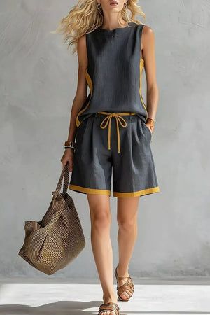 Dark gray tank and shorts set with yellow contrast trim, drawstring waist, and crew neck.