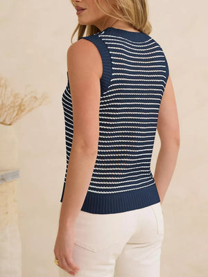 Navy blue and white striped knit sweater vest with textured details.