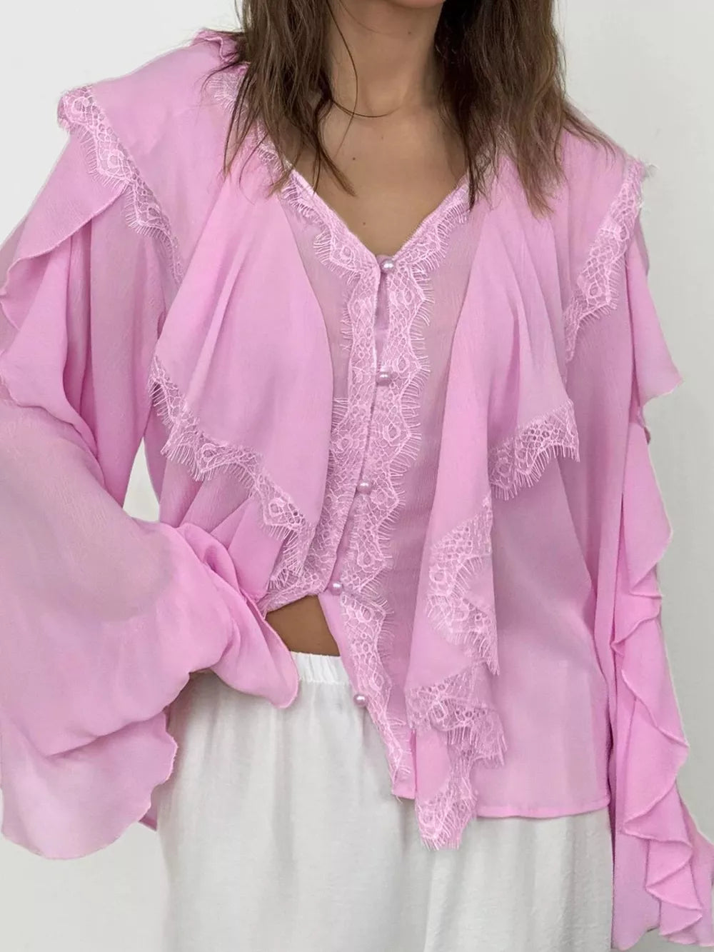 blouse in beige with lace trim and hip-length