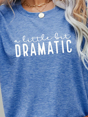 Cobalt blue crew neck tee with white text that reads "a little bit DRAMATIC".