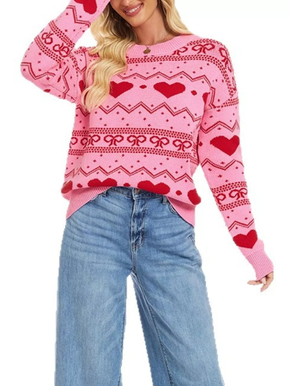 pullover sweater in Red with fair isle with hearts and bows and ribbed cuffs