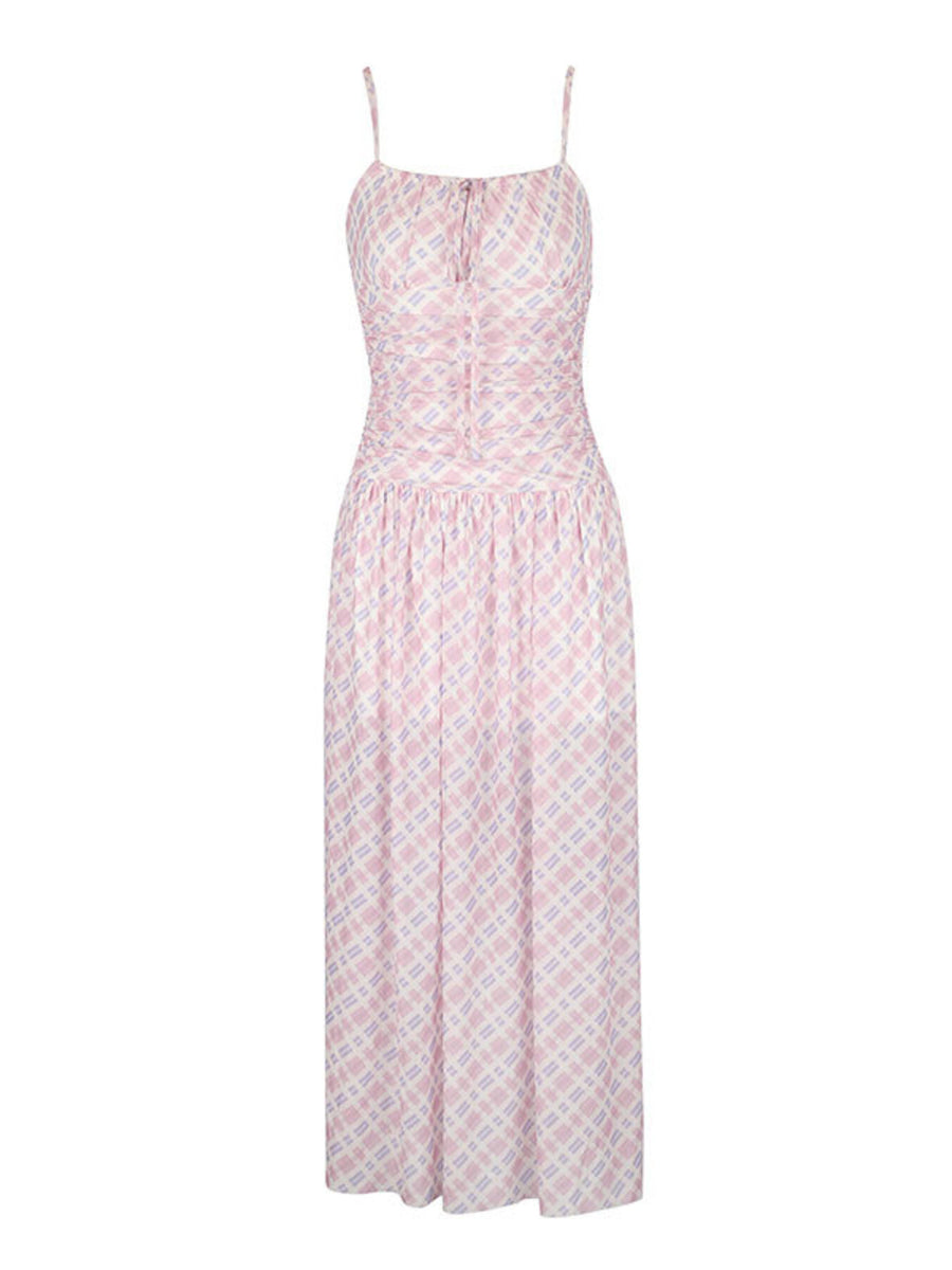 Ruched tied maxi dress in pink and white plaid, with spaghetti straps and a sweetheart neckline.