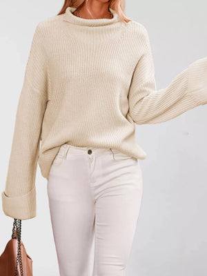 100% polyester Care instructions: Machine wash cold mock neck sweater in Green with oversized silhouette