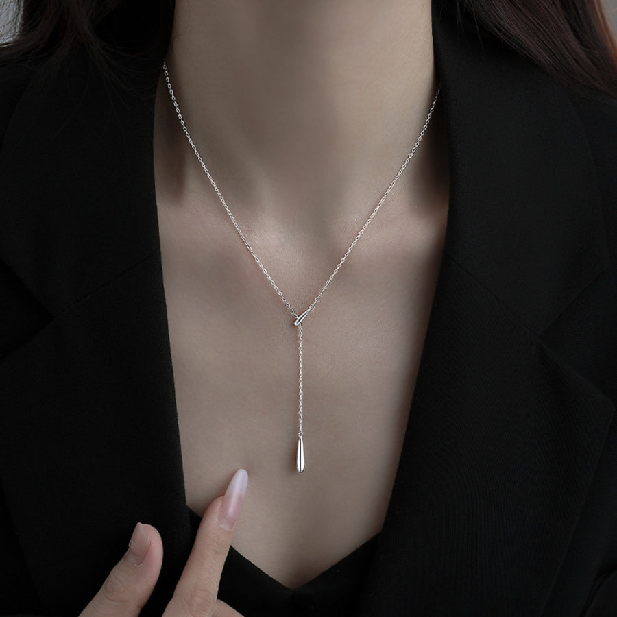 Silver Y-shaped pendant necklace with a single drop charm, 18k gold-plated.