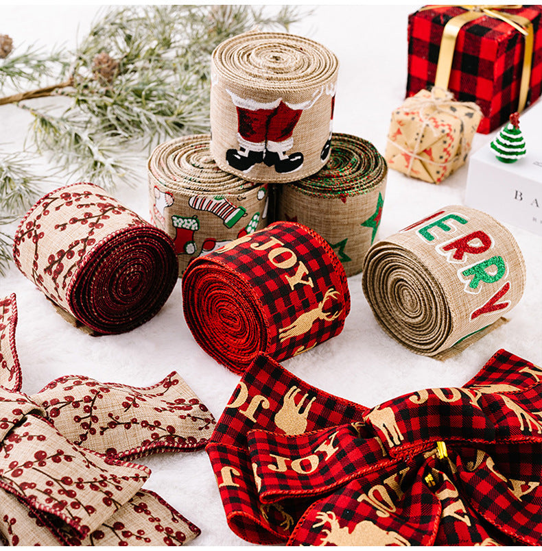 Festive holiday ribbons in burlap with Christmas designs like Santa, stockings, and plaid with JOY and deer.
