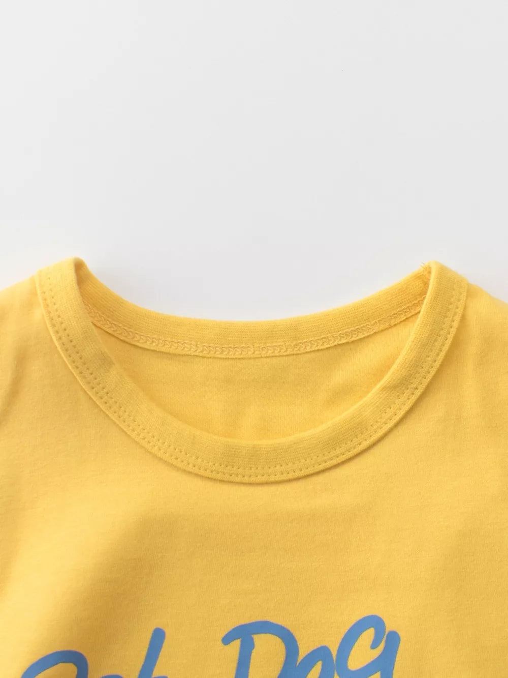 Yellow cotton t-shirt with blue graphic text and crew neck