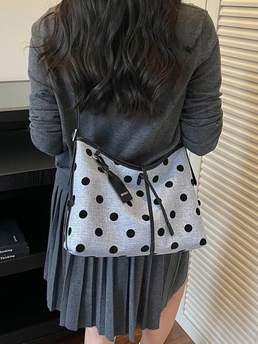 handbag in Blue with polka dot and shoulder strap