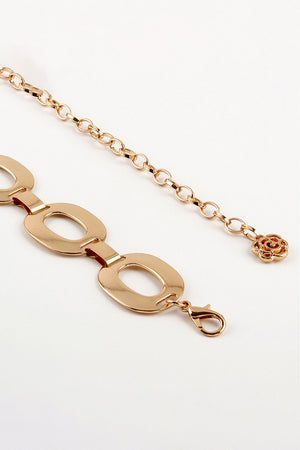 Gold oval link chain belt with lobster clasp and rose detail