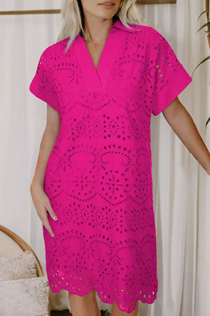 Bright pink cotton eyelet dress with V-neck and short sleeves.