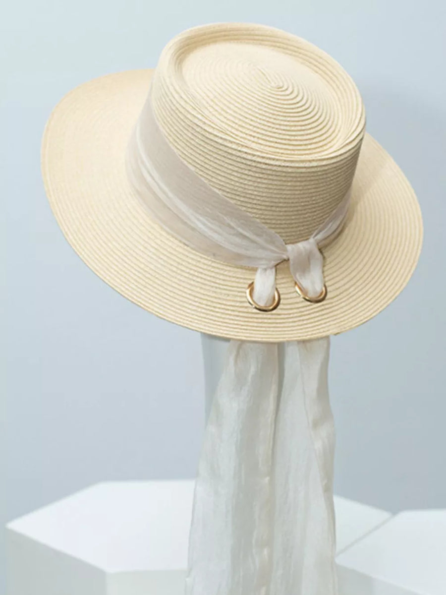 Ivory straw sun hat with sheer ribbon and gold ring embellishment