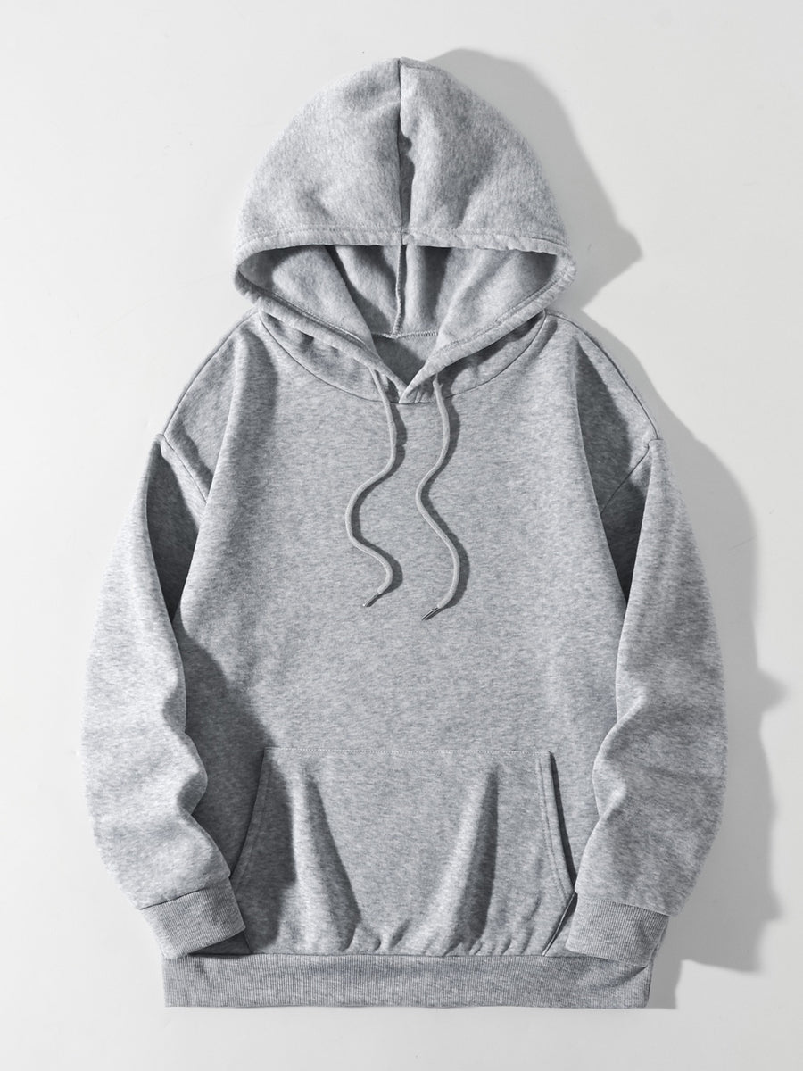 Gray oversized hoodie with pouch pocket and drawstring hood