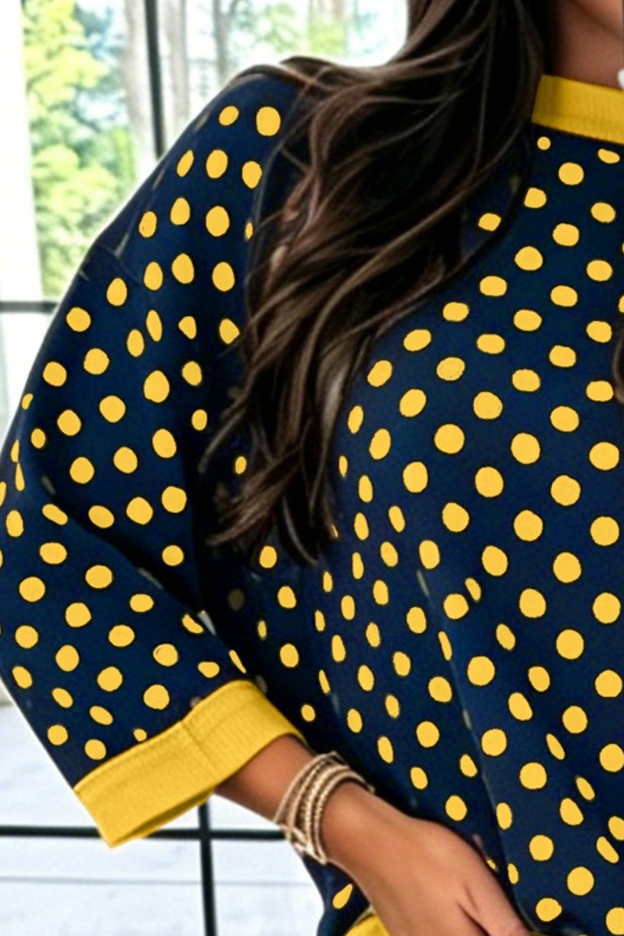 yellow sweatshirt featuring oversized and polka dot