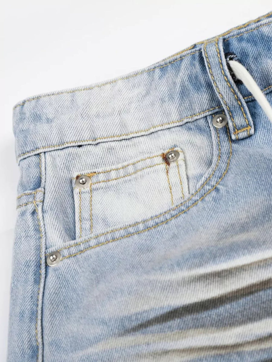 Light blue distressed wide-leg capri jeans for men with drawstring detail.