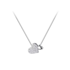 Elegant heart pendant necklace with pave zircon detail on a sterling silver box chain.