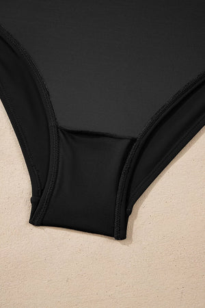 one-piece swimsuit in black with ruched and full-length