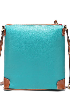 Turquoise leather crossbody bag with brown trim and stitching