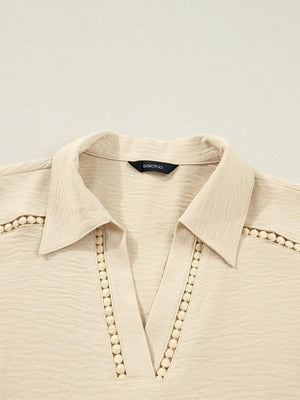 Apricot crinkled texture shirt with Johnny collar and pom-pom trim detail