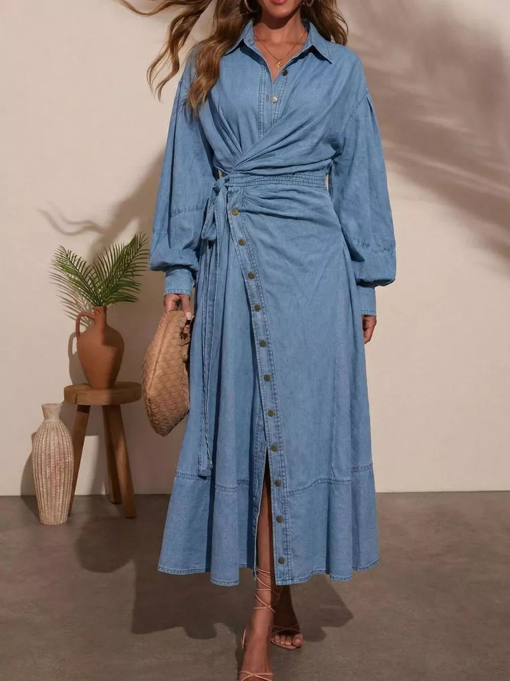 wrap dress in light blue featuring buttoned and A-line fit