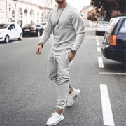 Men's gray textured loungewear set with crewneck sweatshirt and drawstring joggers