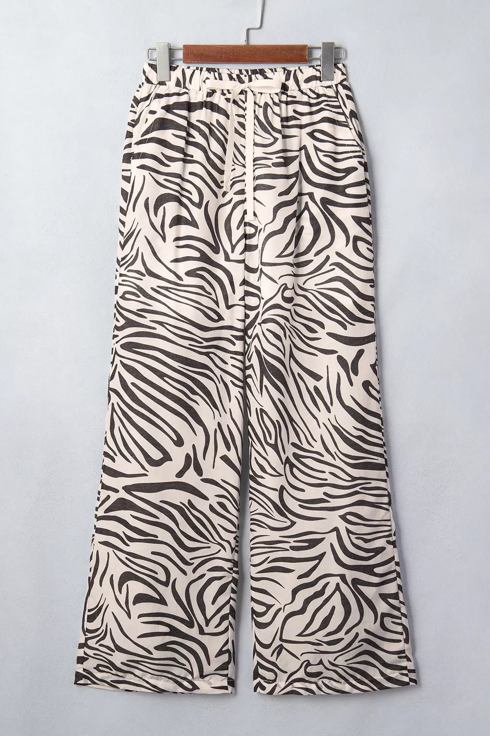 wide-leg pants featuring zebra-print in dark olive green with 100% polyester Care instructions: Machine wash cold texture