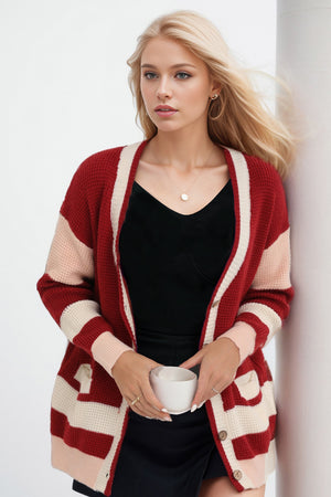Red striped knit cardigan with long sleeves and pockets
